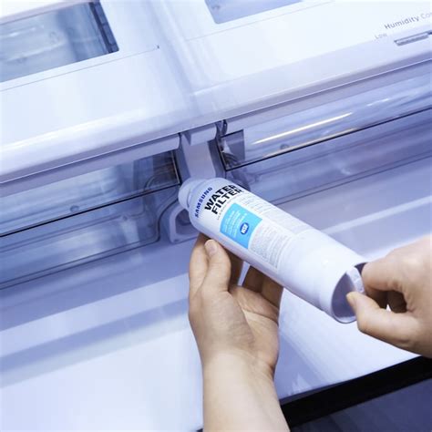 Press and hold both the Ice Type and Child Lock buttons for 3 to 5 seconds. . Samsung fridge red filter light